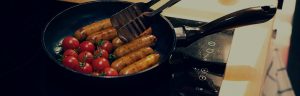 Sausage Cooking in Frying Pan