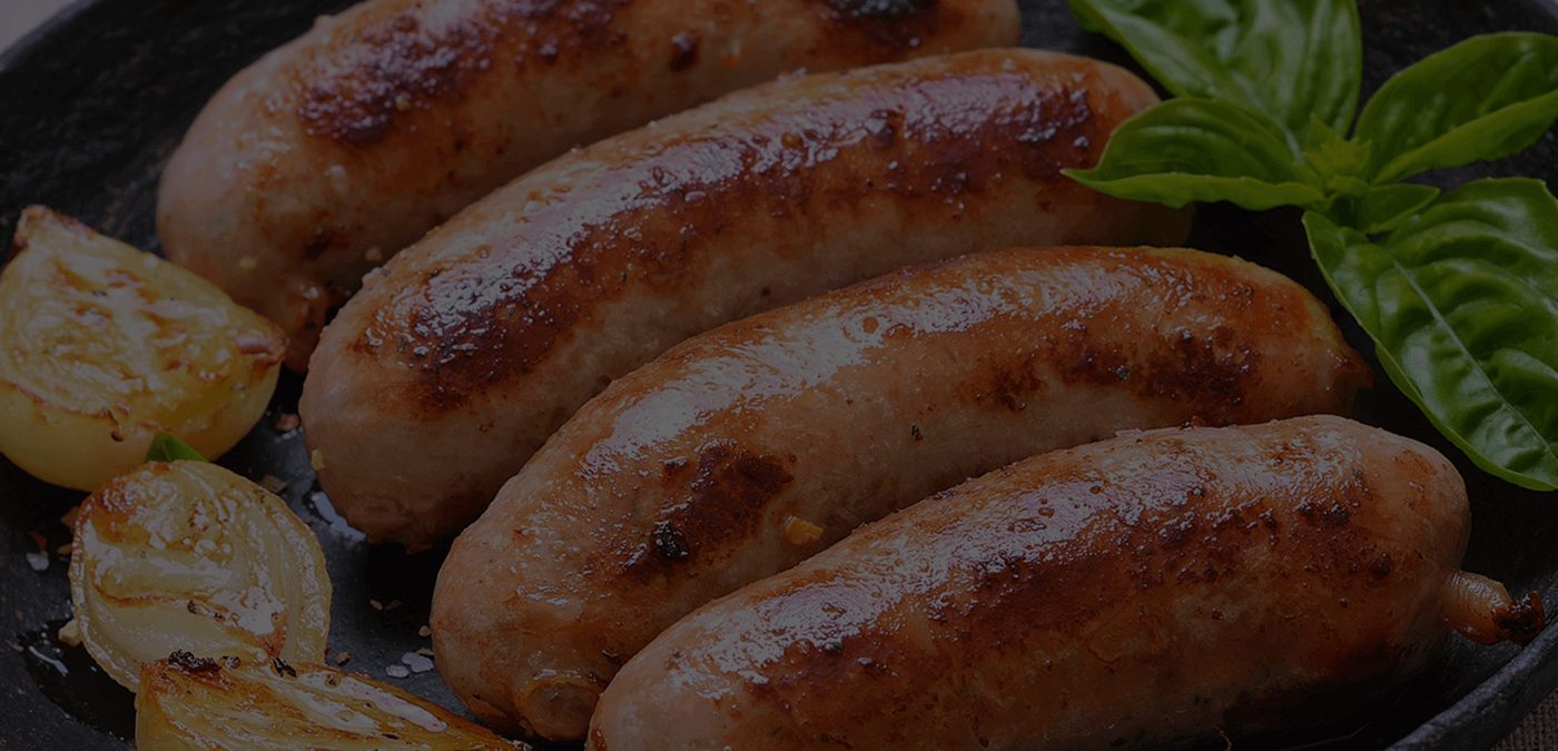 The Trick For The Juiciest Grilled Sausages Is Poaching Them First